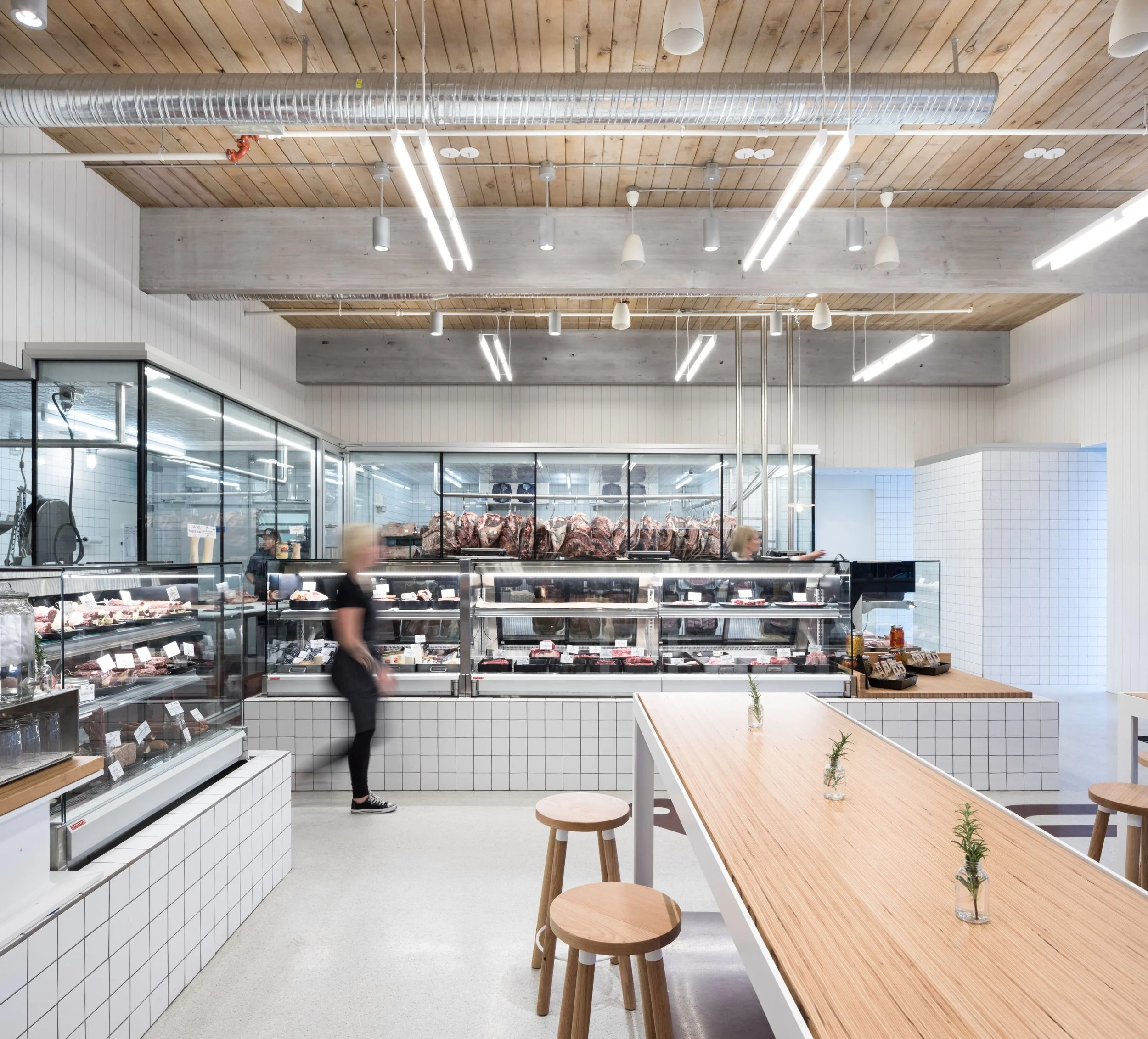 Two Rivers Meats by Campos Studio, butcher, restaurant, and retail interior in North Vancouver, BC