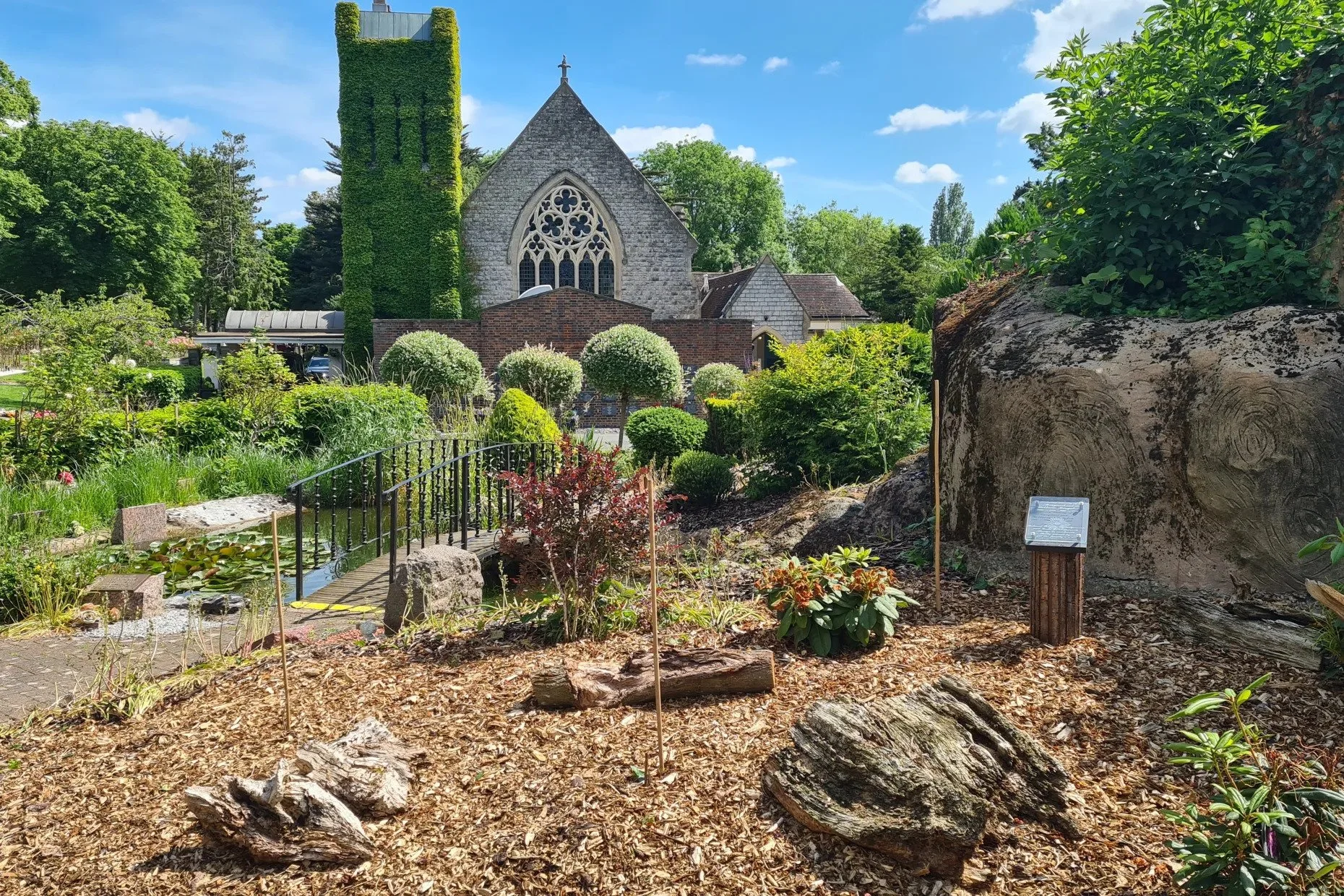 The historic exterior of Beckenham Crematorium with its ivy-clad tower