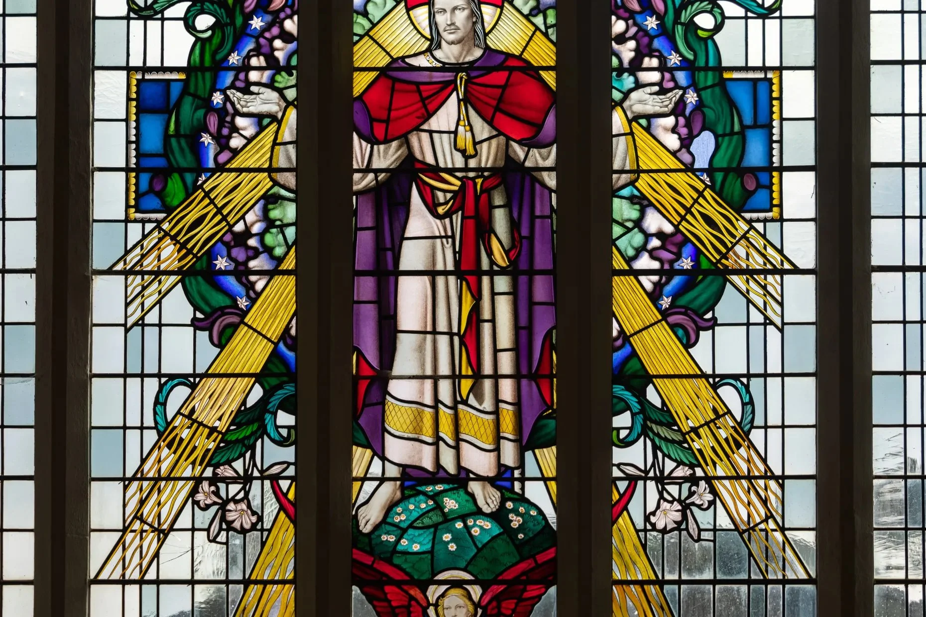 The tall stained-glass window within Beckenham Crematorium chapel