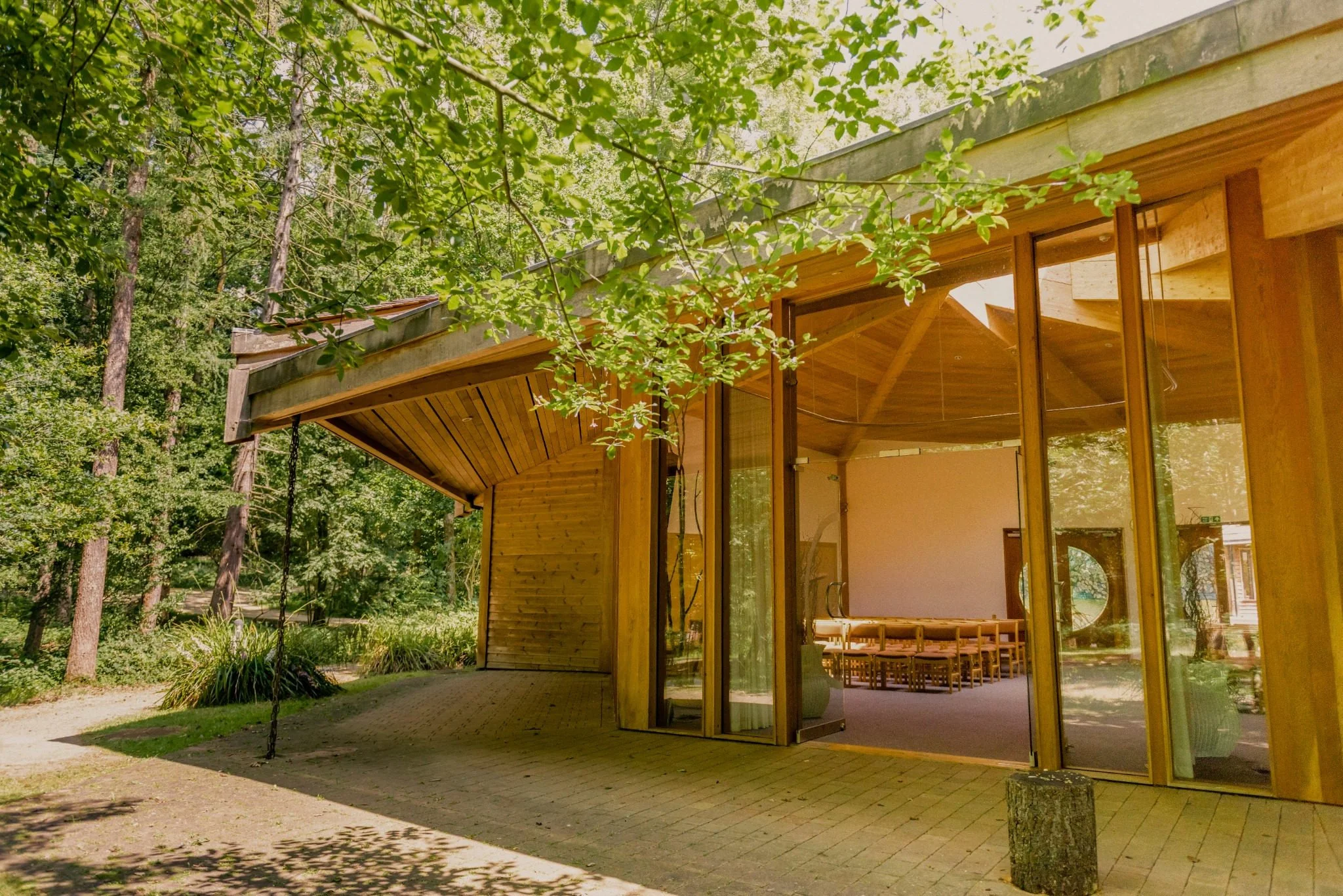 Contemporary exterior of the GreenAcres Chiltern Park Woodland Hall within the wooded landscape