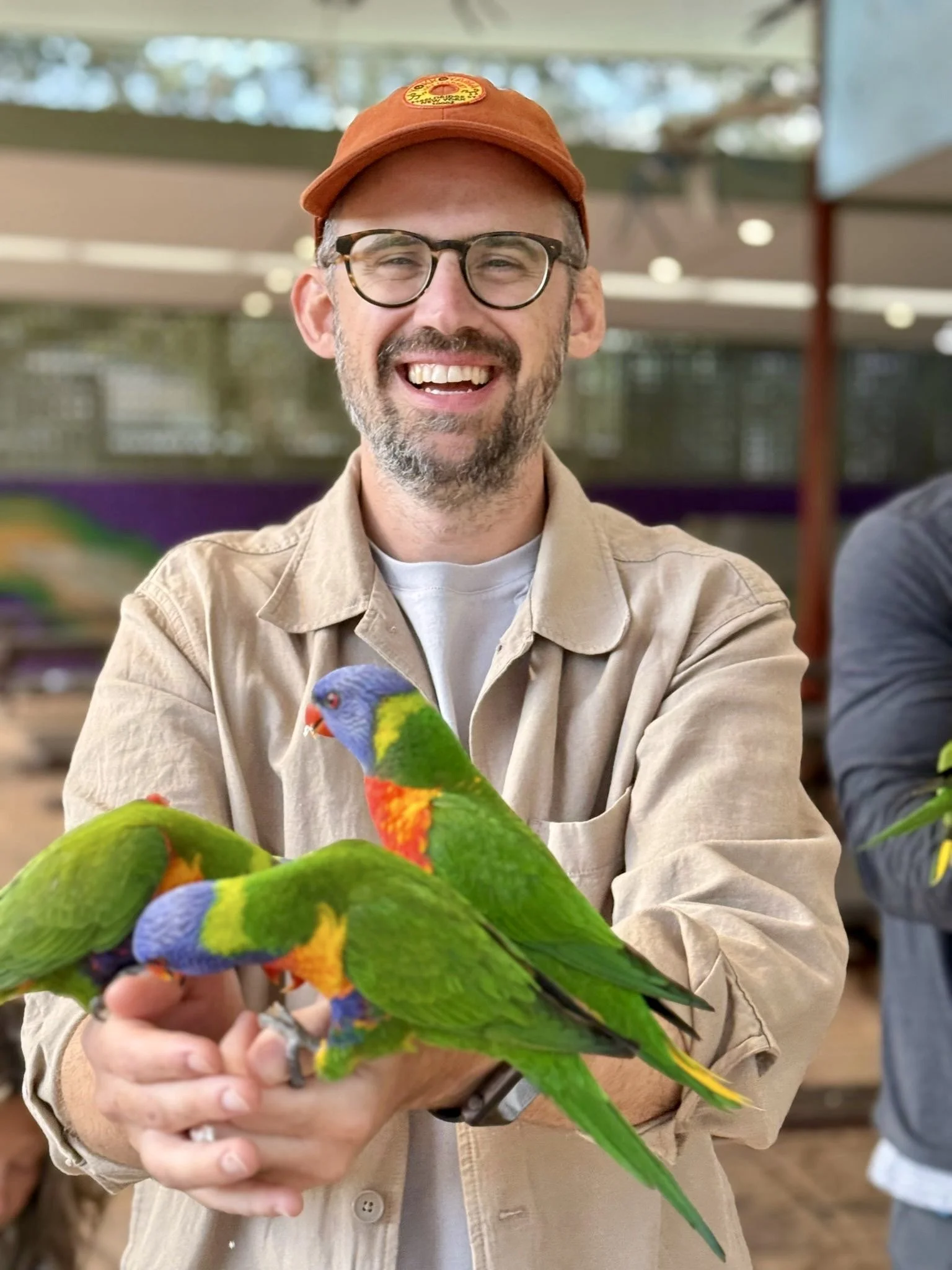 Seth with parrots in Australia
