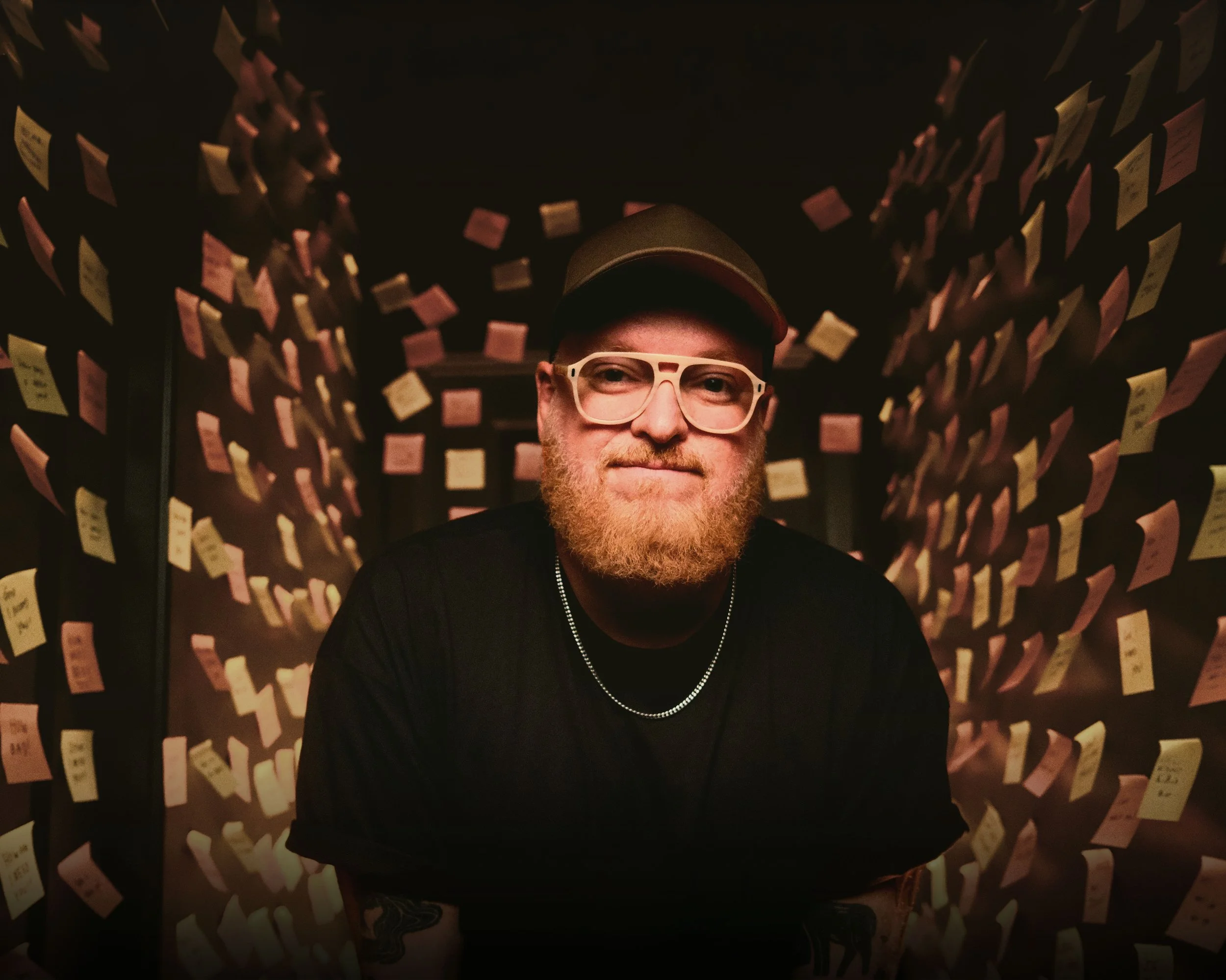 Stephen McWhirter in a room covered in sticky notes