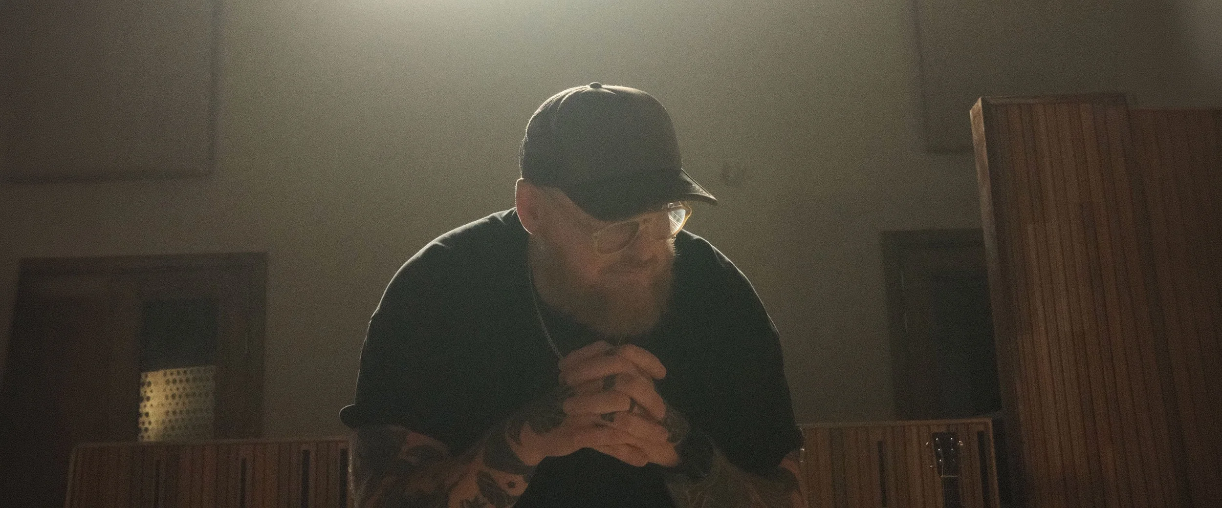 Stephen McWhirter with his hands clasped in prayer