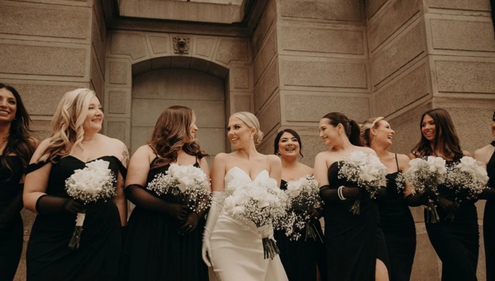 Bridal party in a stone hall