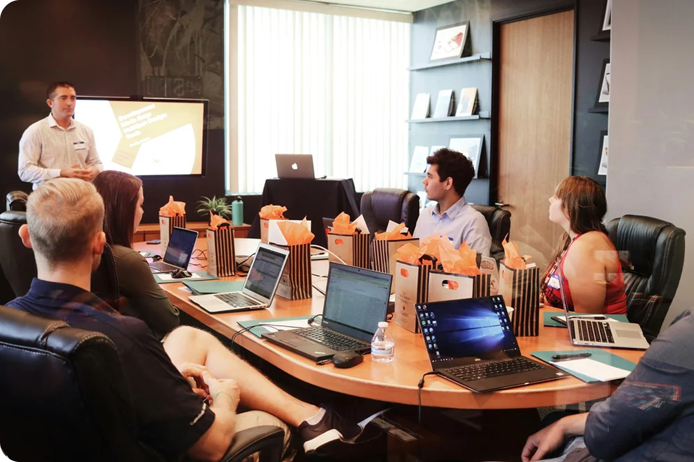 International student interns collaborating in a project meeting