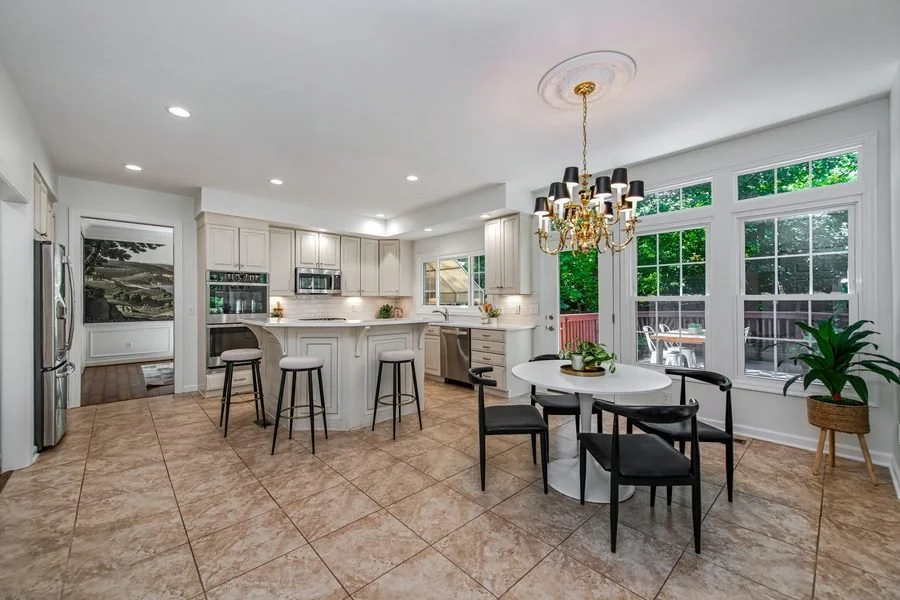 Sunlit sunroom and dining area