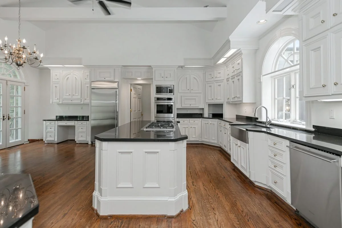 White kitchen with large island