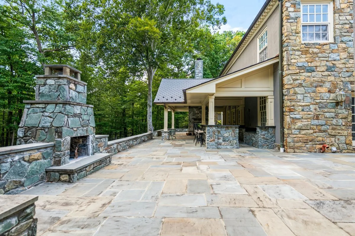 Stone patio with outdoor fireplace