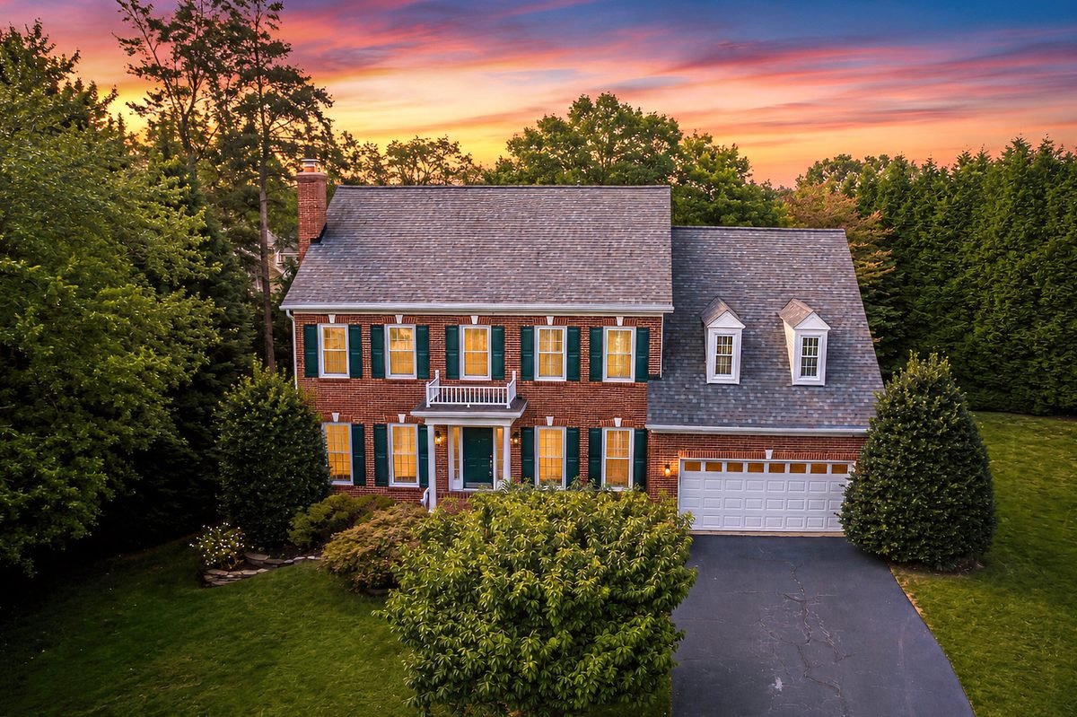 Brick colonial at twilight