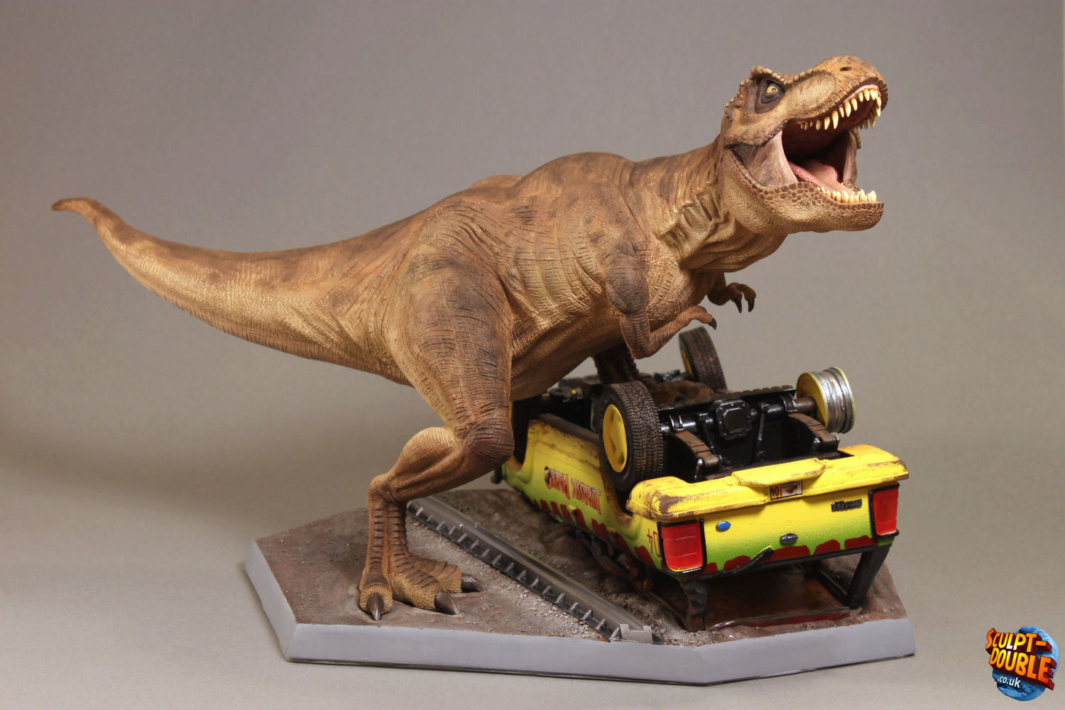 By Nathan Flynn Jurassic Park T-rex &amp; Ford Explorer sculpture. 