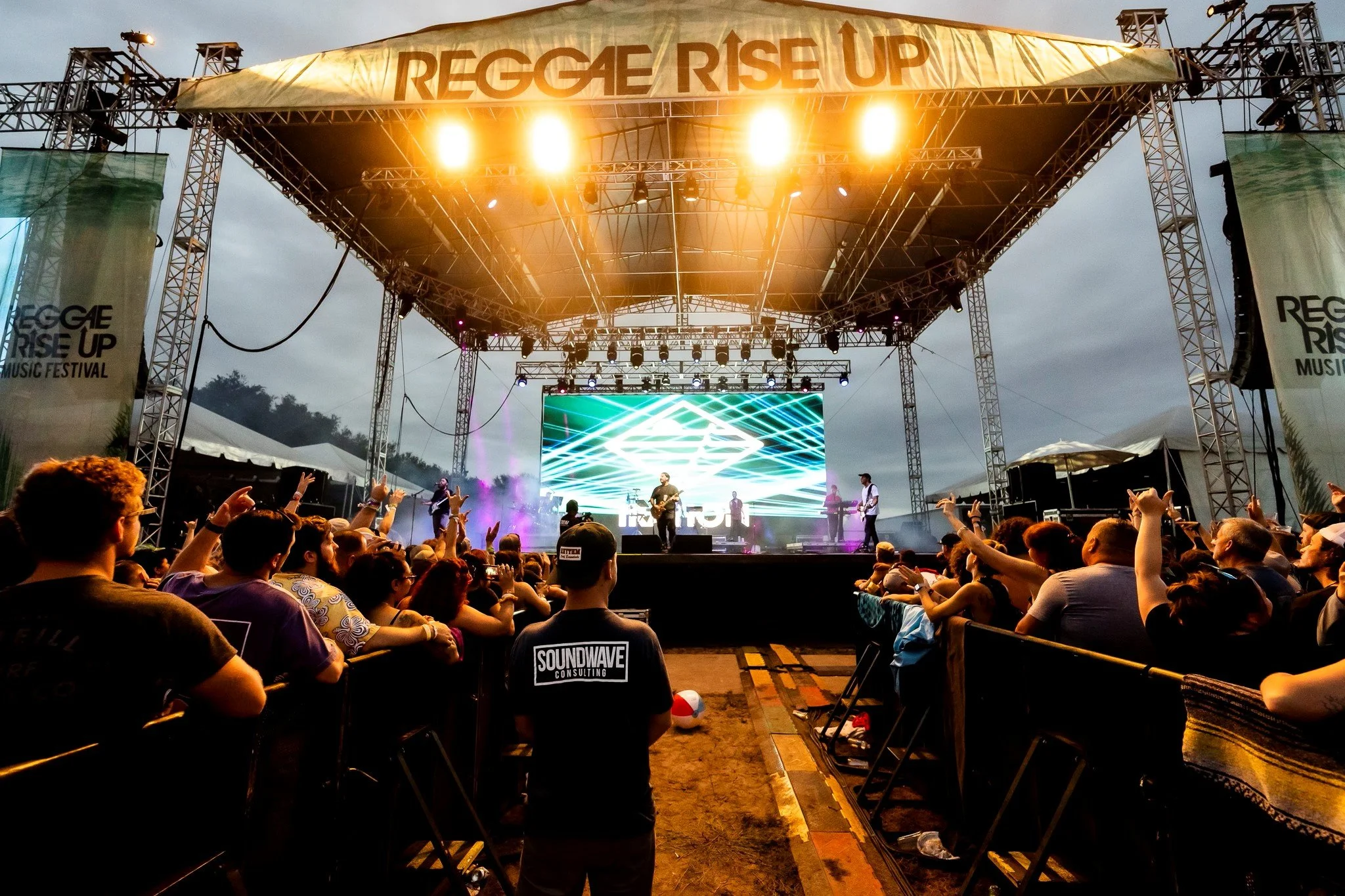 Backstage control room and crowd at live event