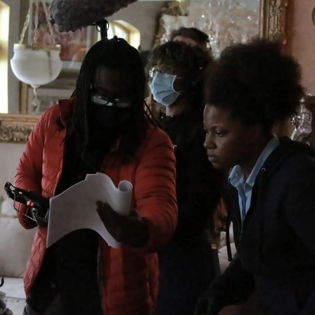 Directing actors on set
