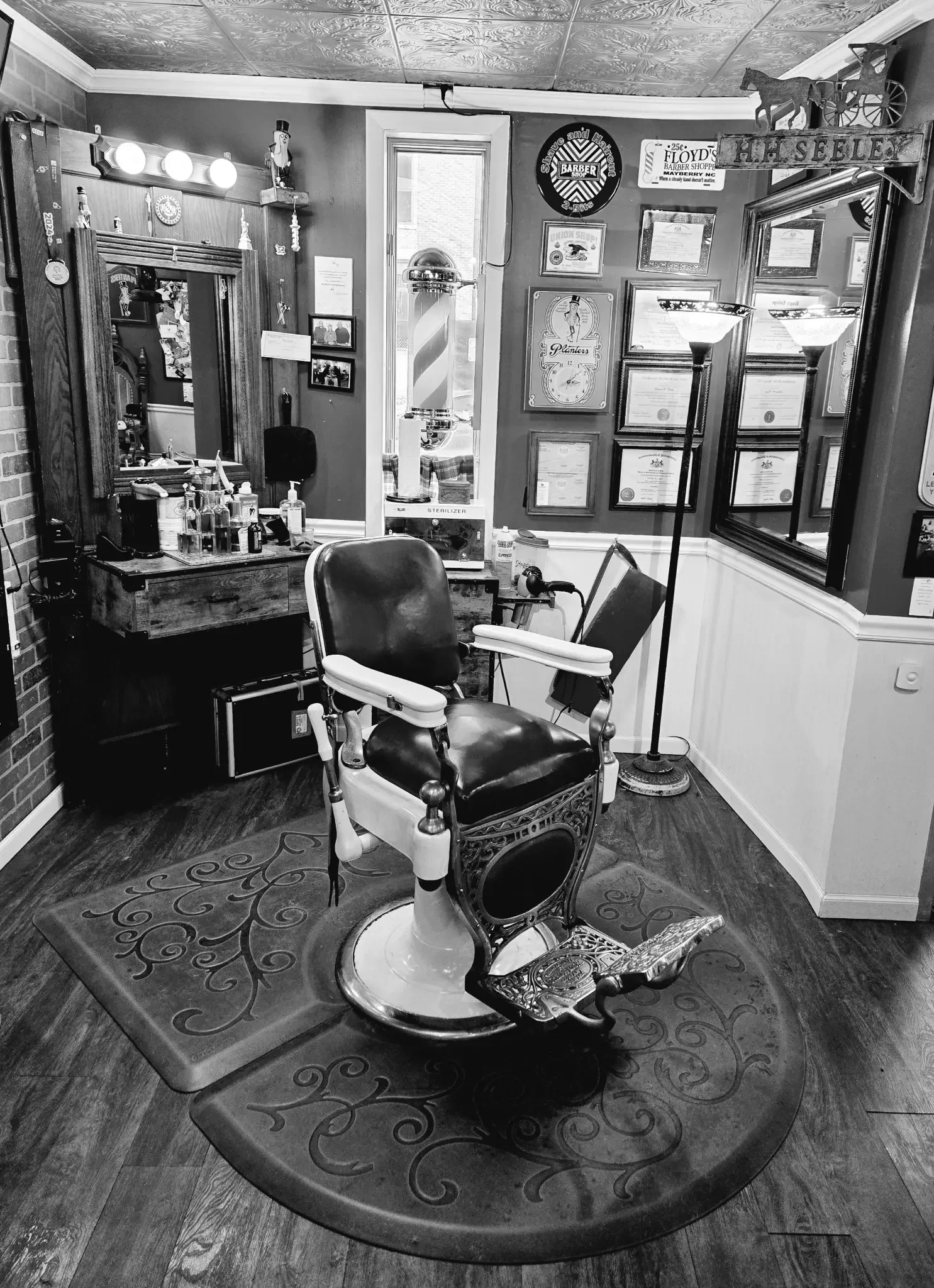 The vintage barber chair and workstation at Carey’s Avenue Barber Shop