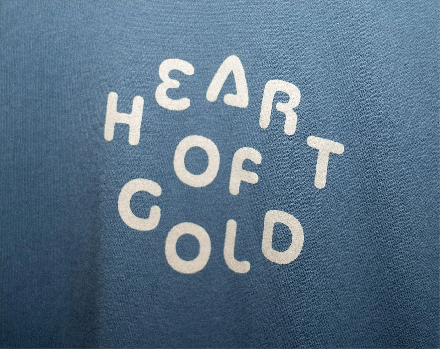 Heart of Gold embroidered text