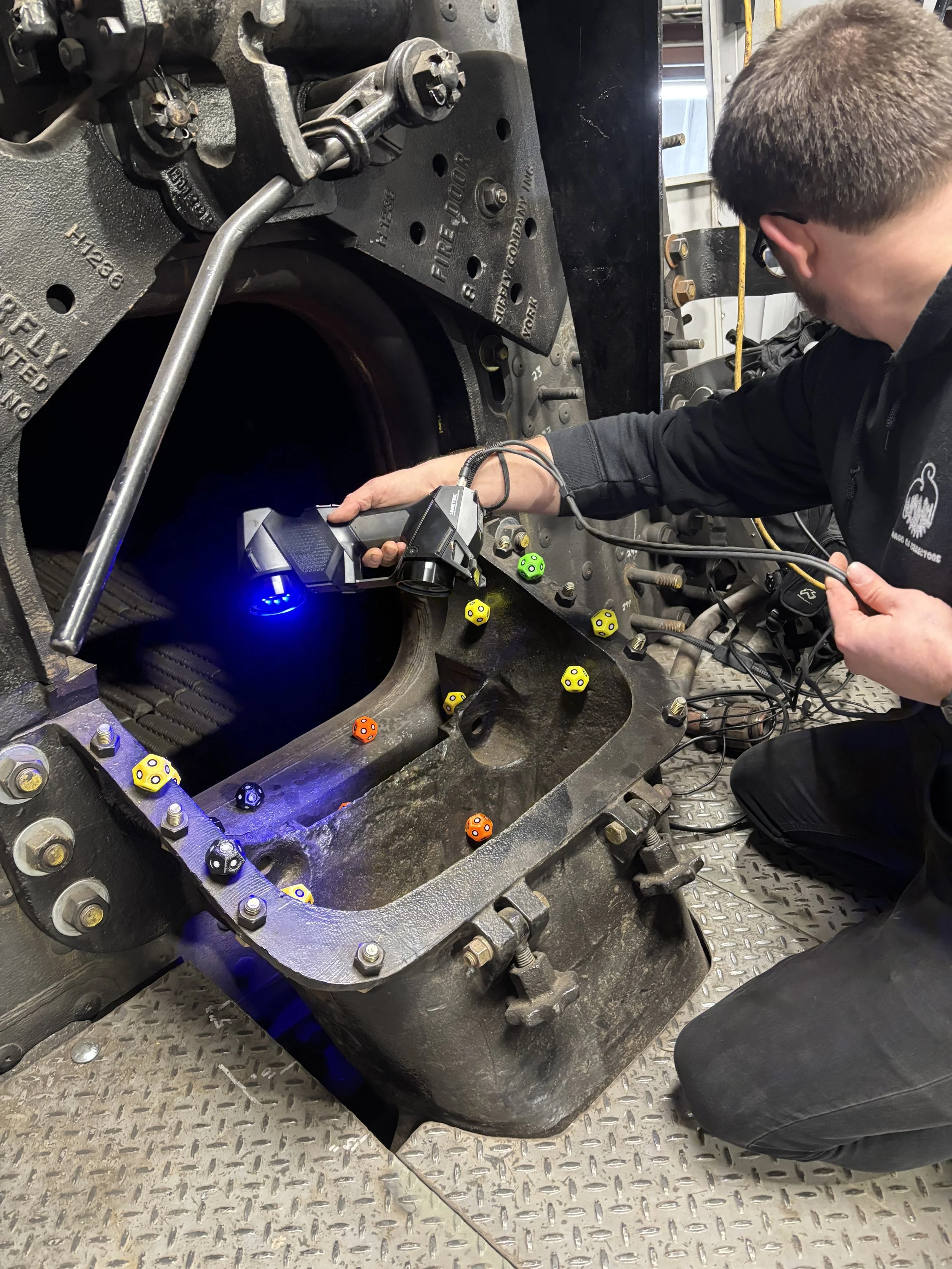 Schimmel Engineering scanning the coal entrance to the firebox of NC&StL No. 576 with a Creaform HandyScan Black Elite