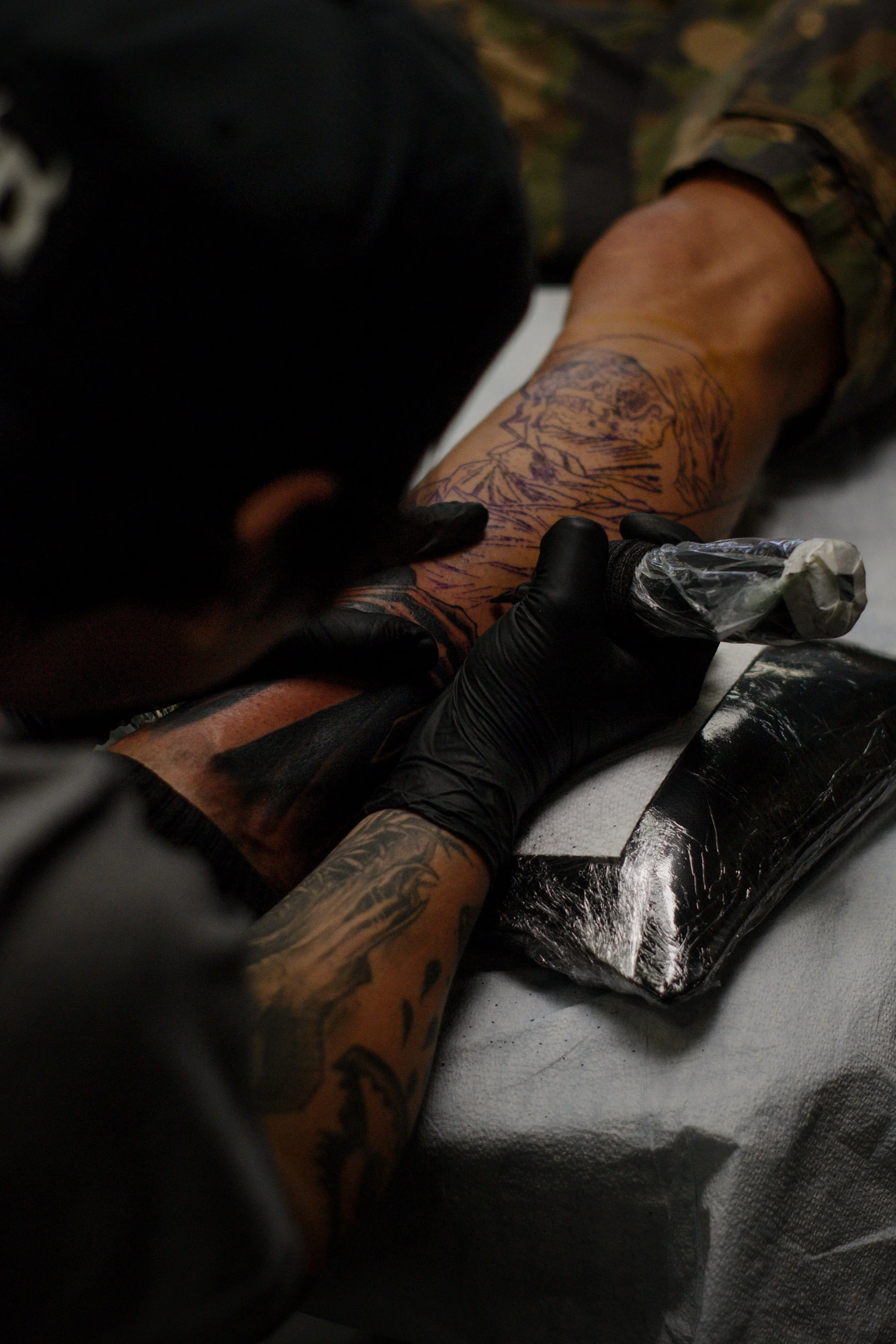 Joseph Carlevato tattooing at Bonedaddys Tattoo