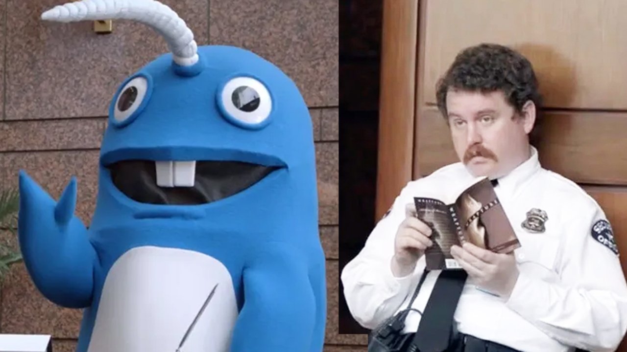 Scott Watson as Carl the Security Guard alongside the blue narwhal in the NJM Insurance commercial