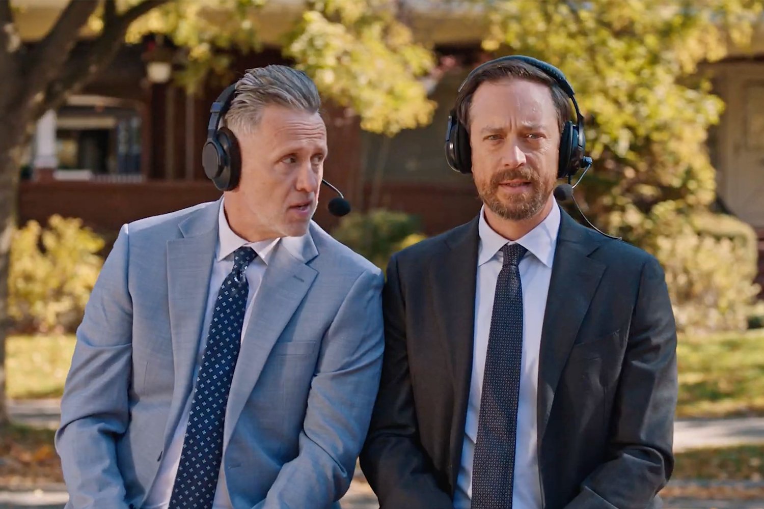 Play-by-play announcers giving commentary during the Ticketmaster NFL commercial.