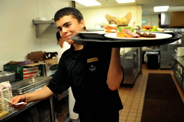 A guy carying meals