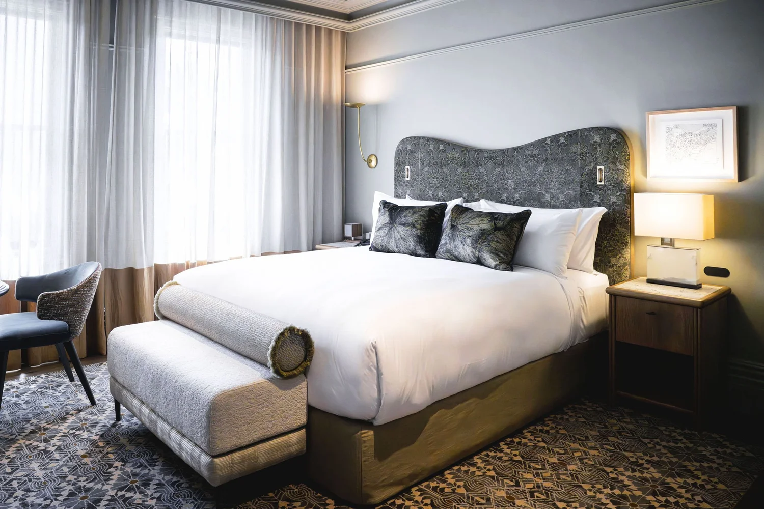A guest room at The Grand National Hotel