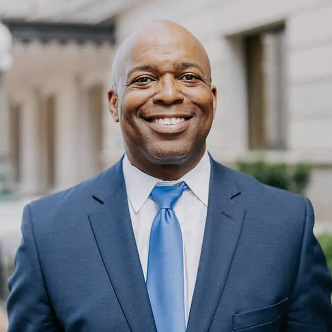 portrait of a black man in a business suit