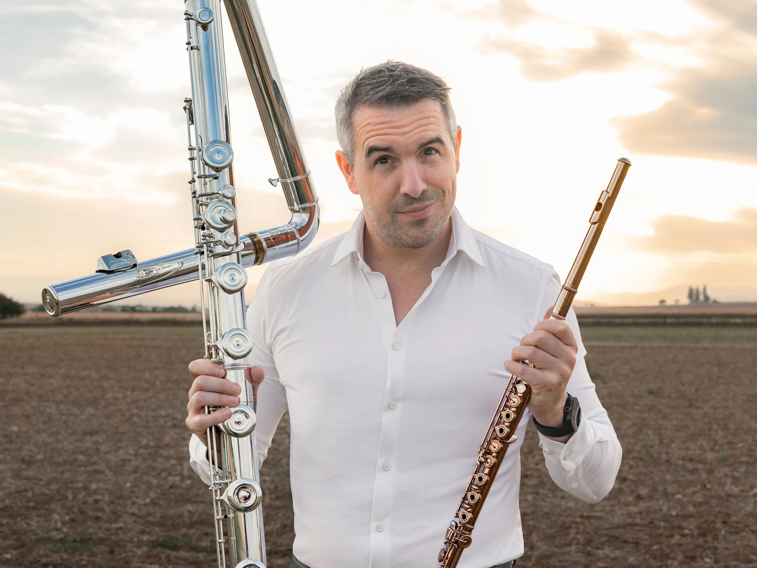 Gareth McLearnon with two flutes