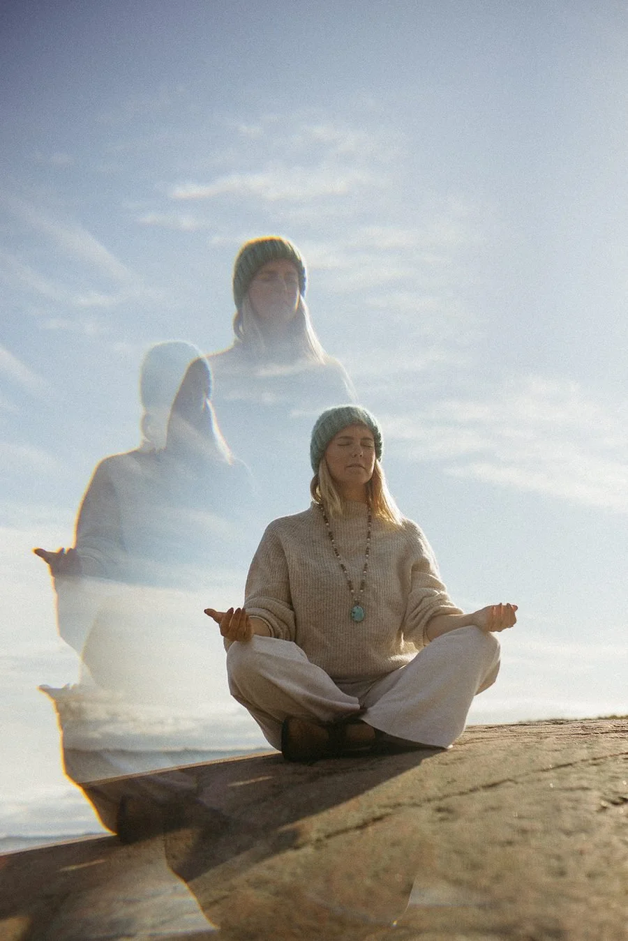 Eva Estlander meditating by the sea