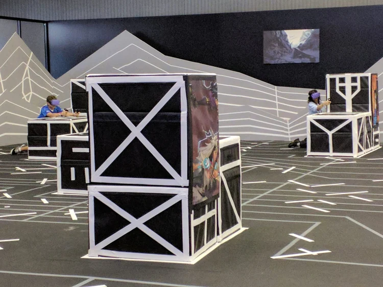 Crates doubled as cover and carried game art.