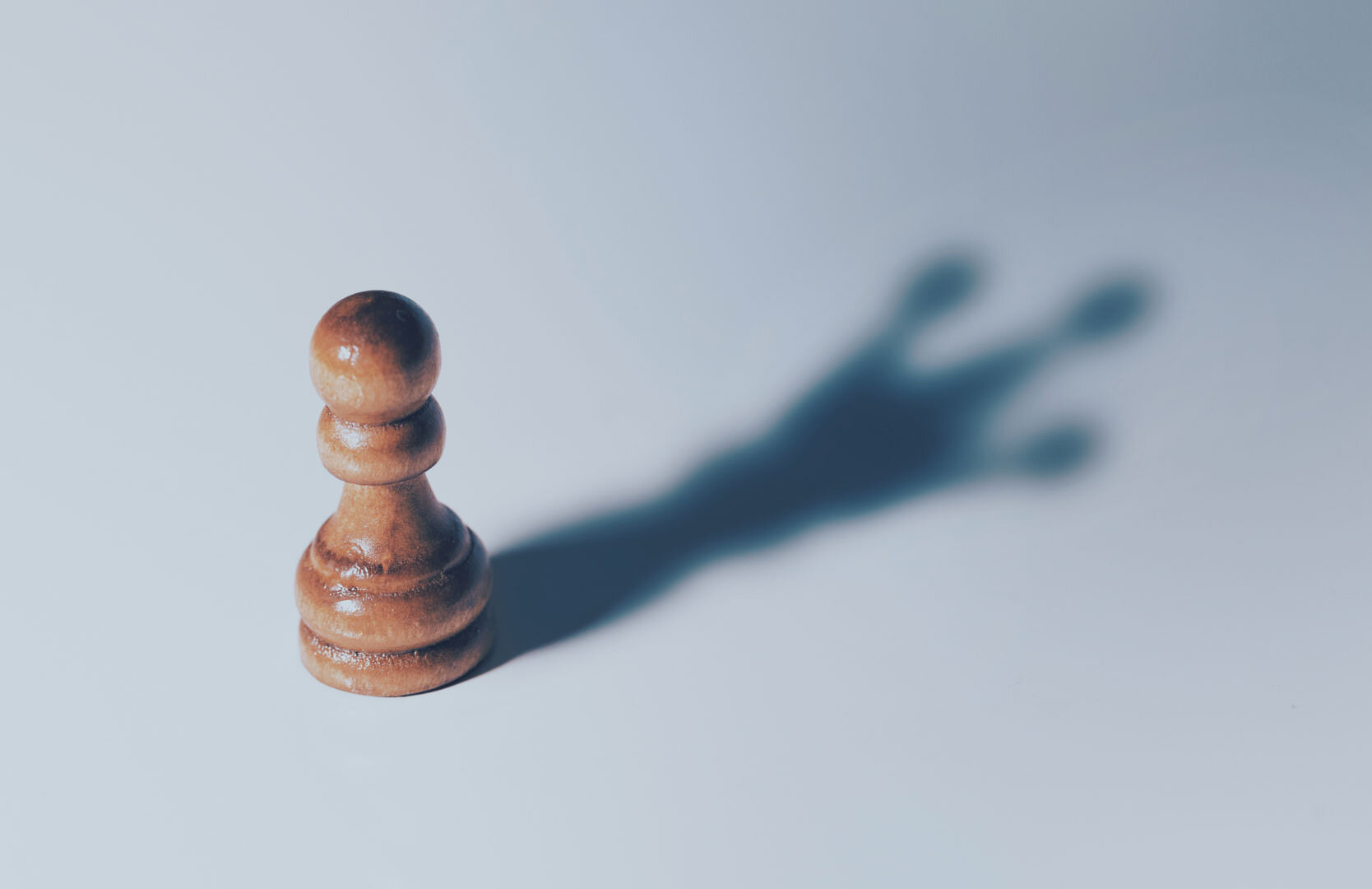 Chess Pawn with Shadow of King