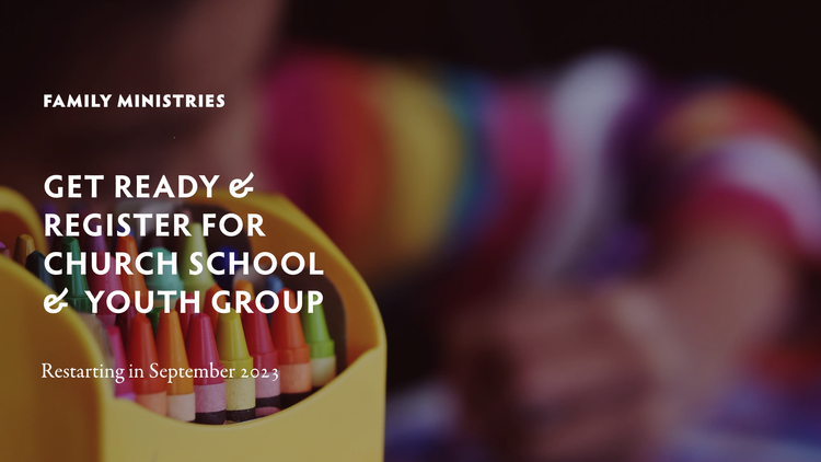 Box of colorful crayons in foreground focus with distant child in rainbow sweater coloring in blurring distance, superimposed with text "Family Ministries Ged Ready & Register for Church School & Youth Group Restarting in September 2023"