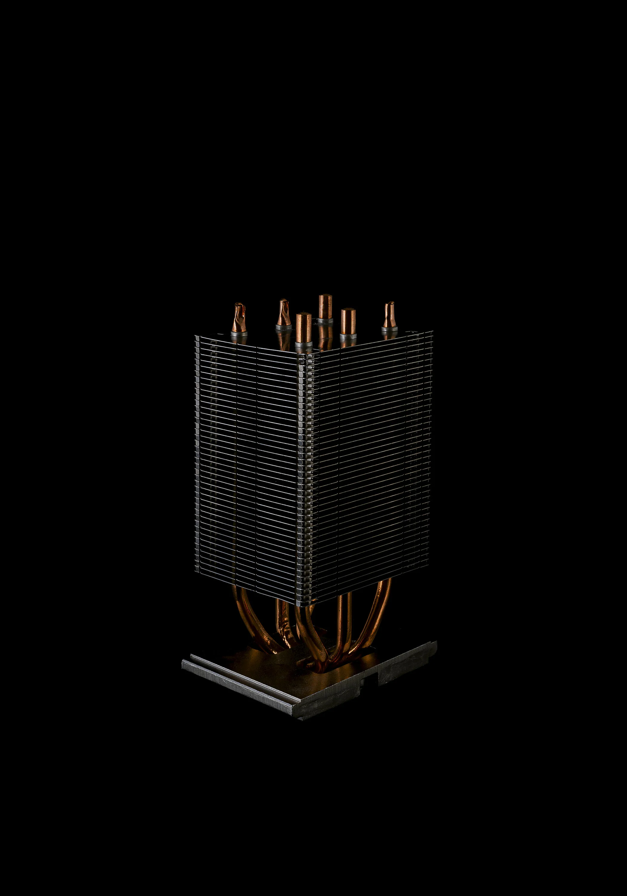 Industrial cooling component photographed against a black background