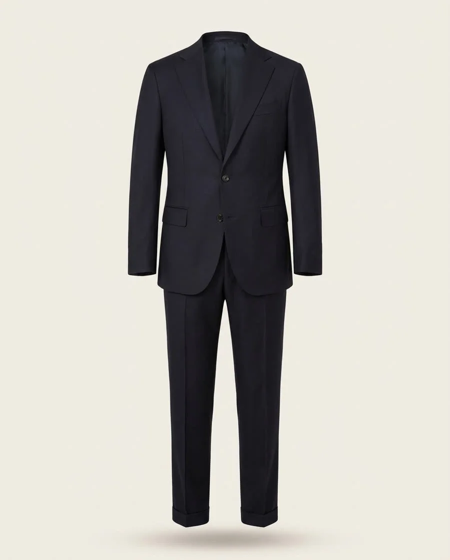 Navy two-piece suit on an off-white ground