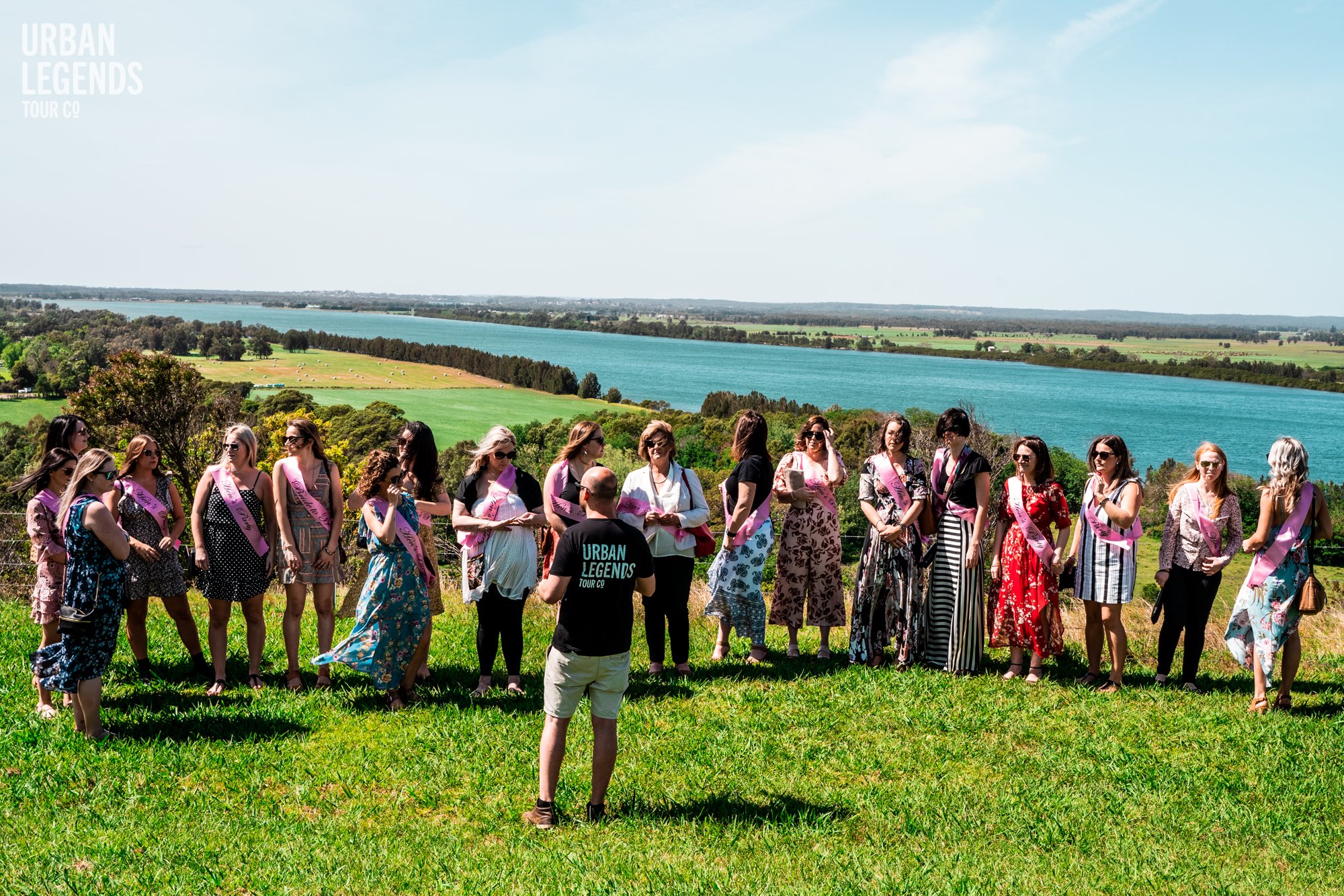 A hens party group at a South Coast escarpment lookout on an Urban Legends hens party tour