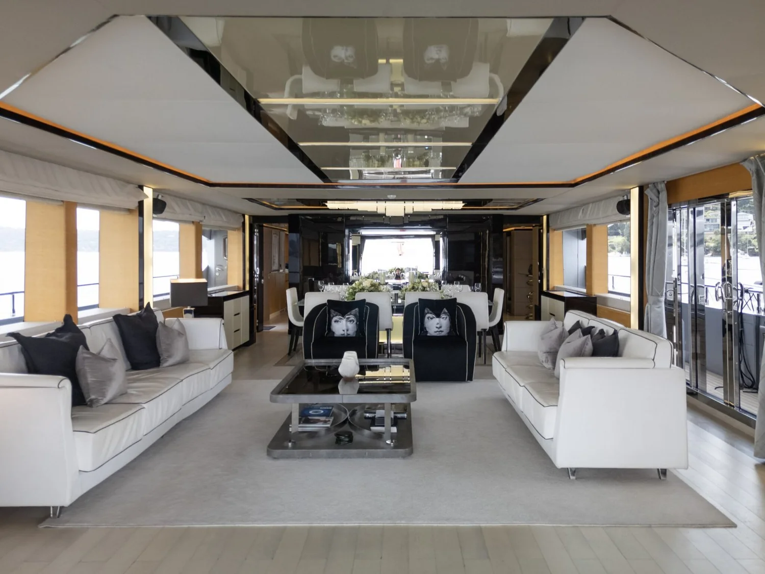 The main saloon of a Ghost Charters superyacht, ready for a corporate function