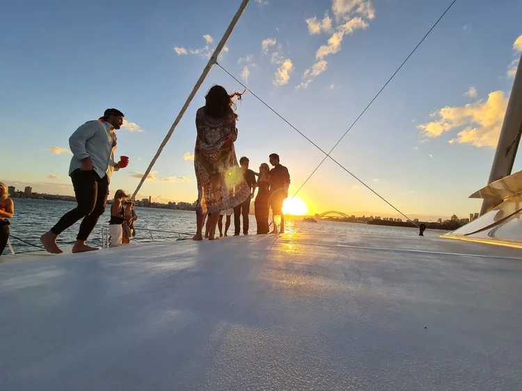 Private yacht party on Sydney Harbour at sunset