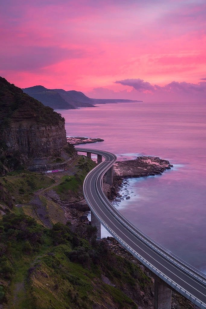 Sunrise over the Sea Cliff Bridge on the Grand Pacific Drive south of Sydney