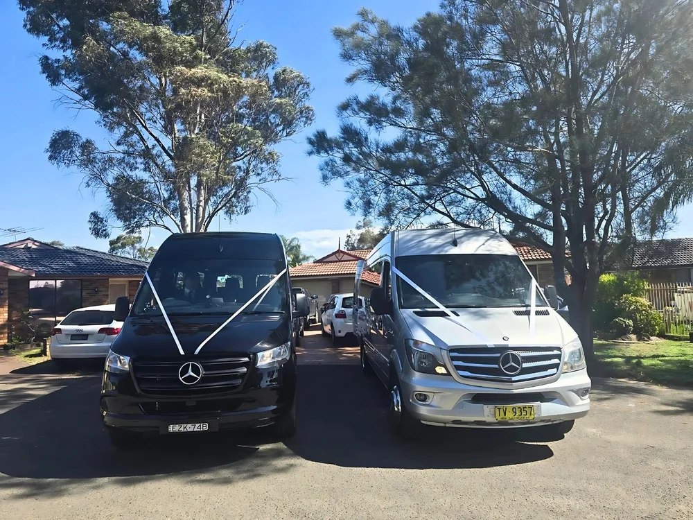 Urban Legends coach on a Sydney street, the vehicle used for wedding guest transfers.