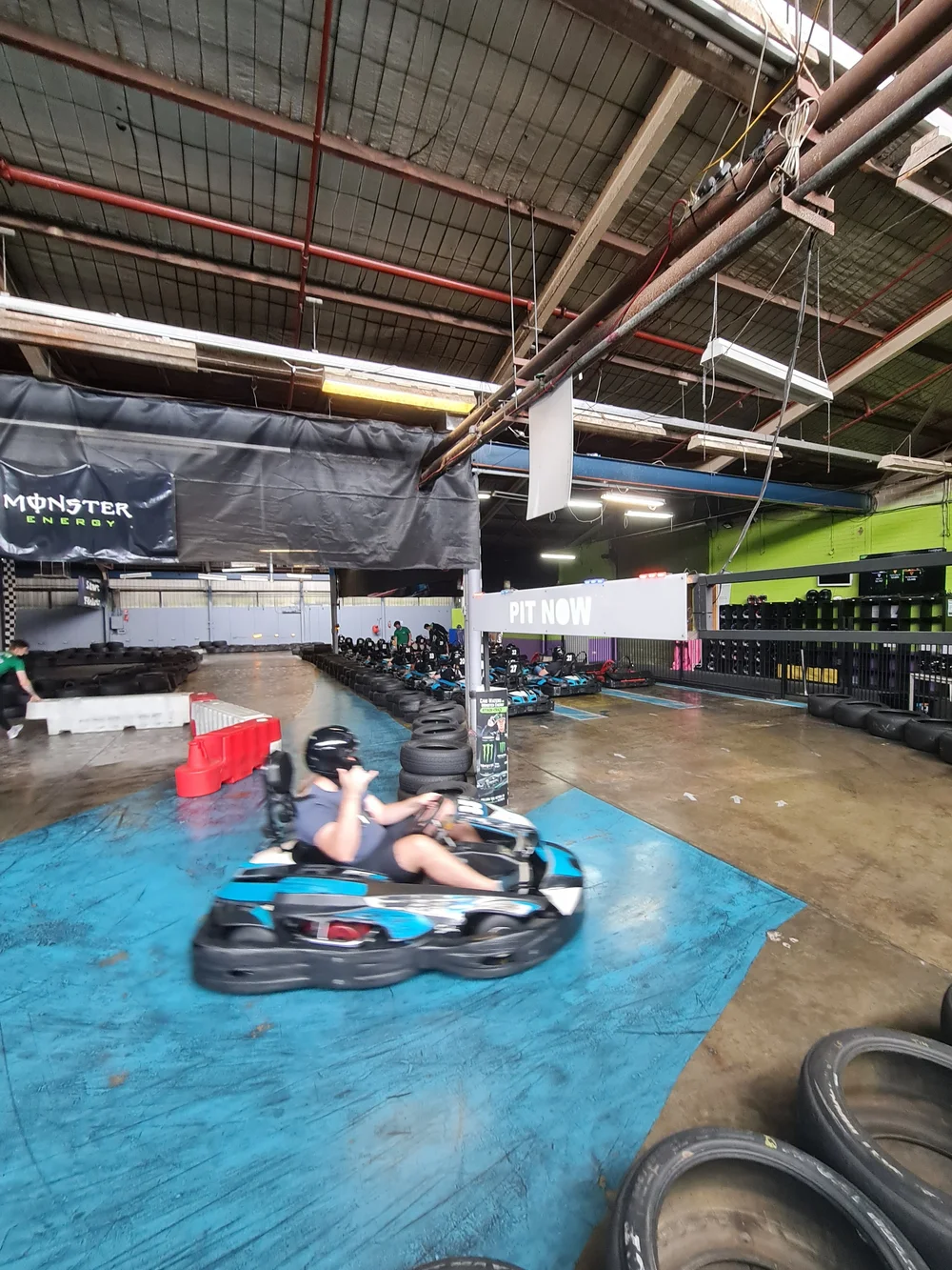 Go kart on an indoor track during a Gold Coast group activity session
