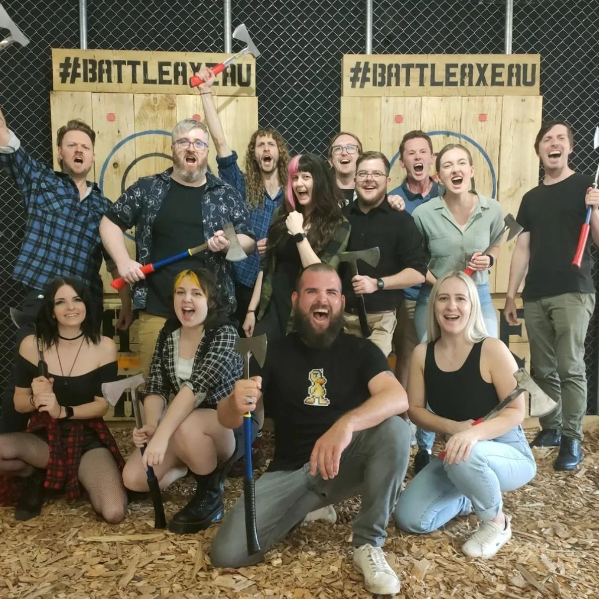 Group celebrating an axe throwing session in Wollongong