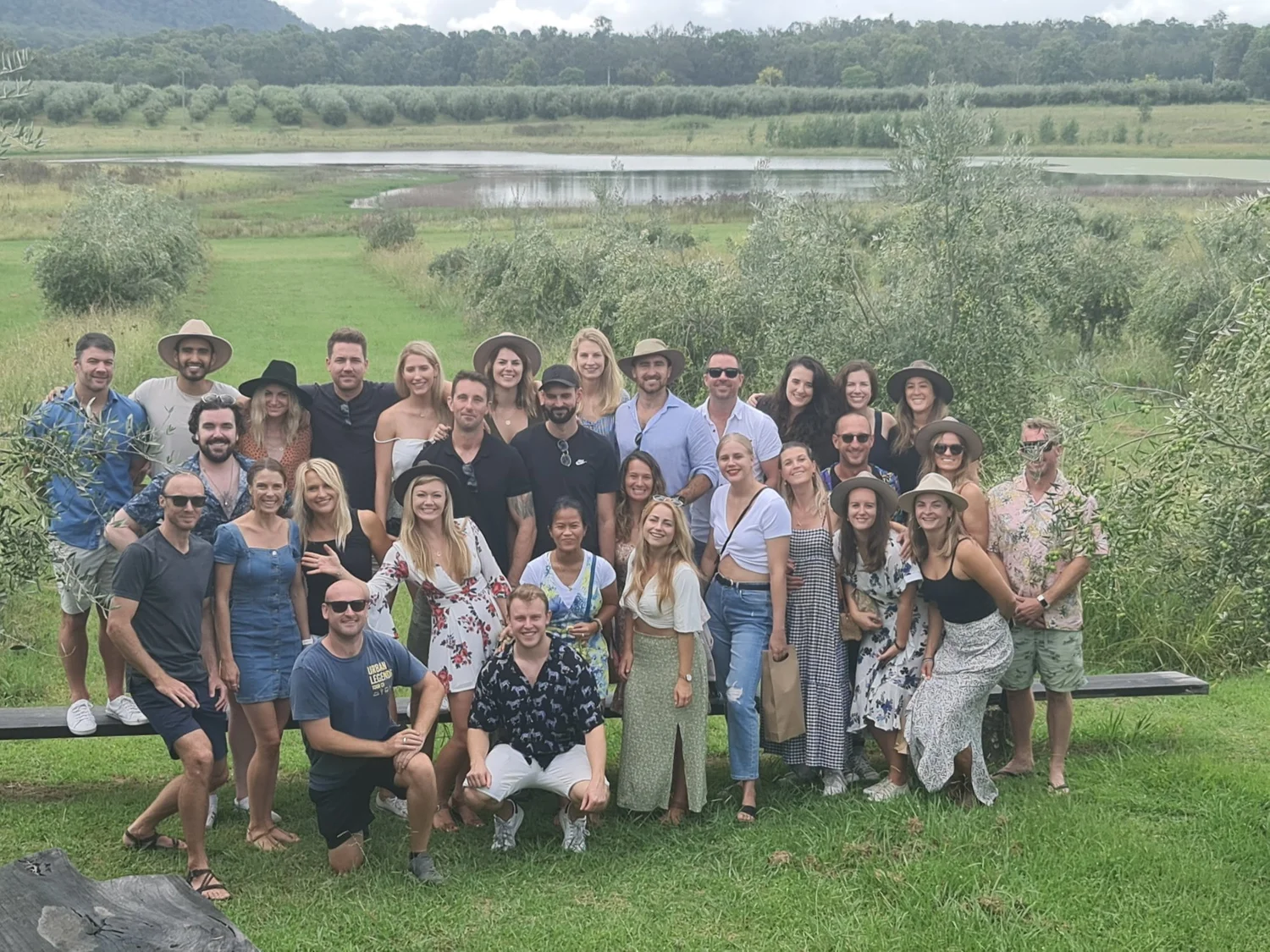 Dressed-up group celebrating together on the lawn on an Urban Legends day out