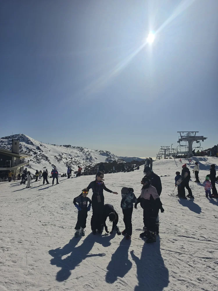 Corporate group on the snow in the Snowy Mountains during a winter incentive program