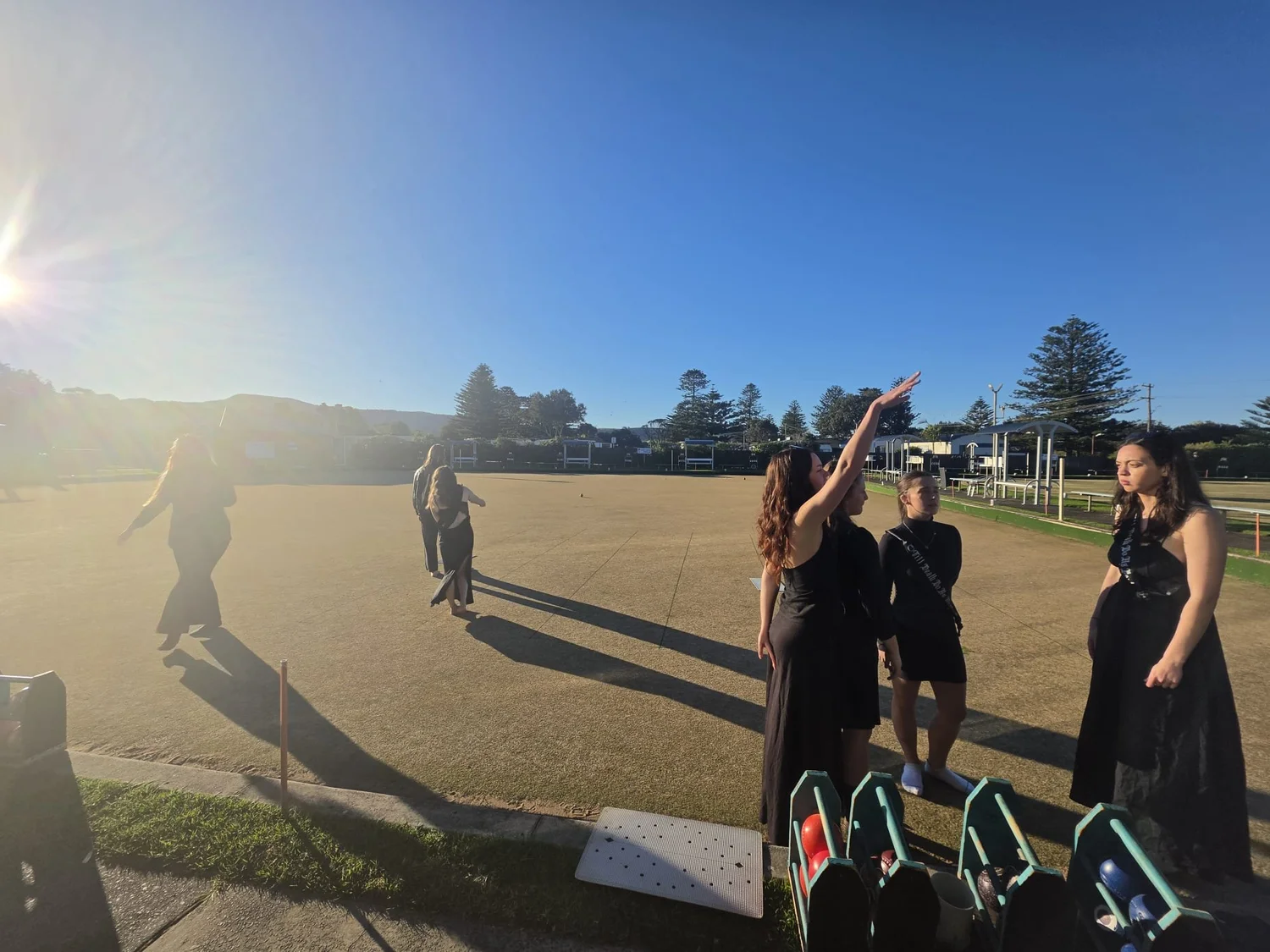 Women playing lawn bowls on a private group day