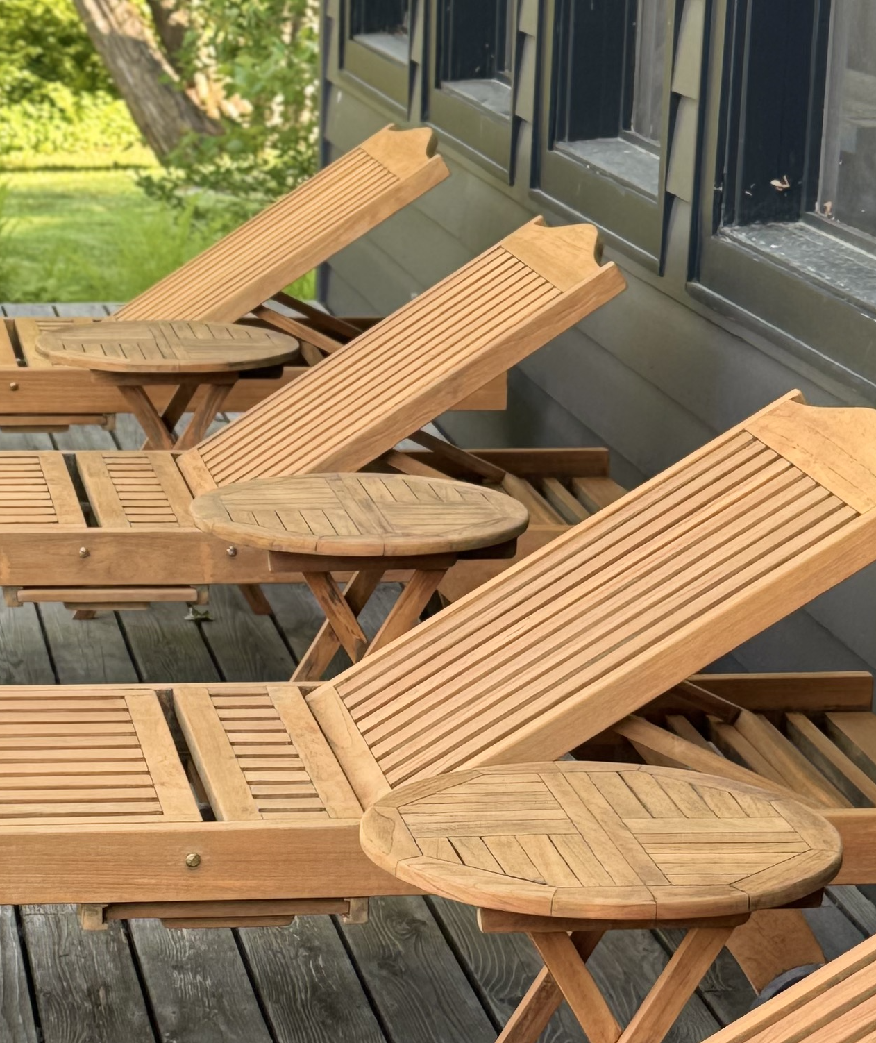 Restored teak recliner with warm honey finish in Port Carling, Muskoka Lakes