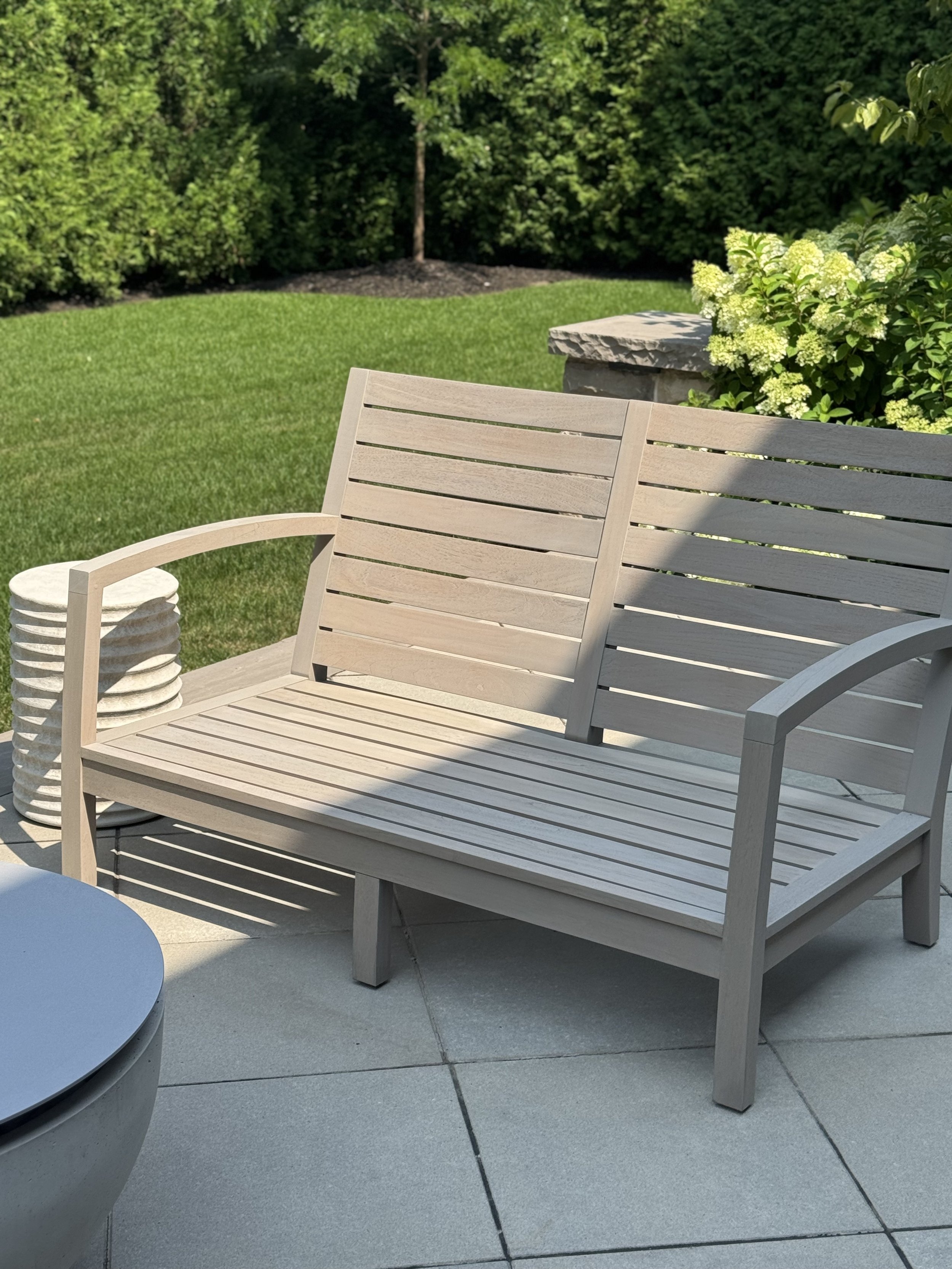 Restored teak furniture with warm honey finish in Sheridan, Mississauga