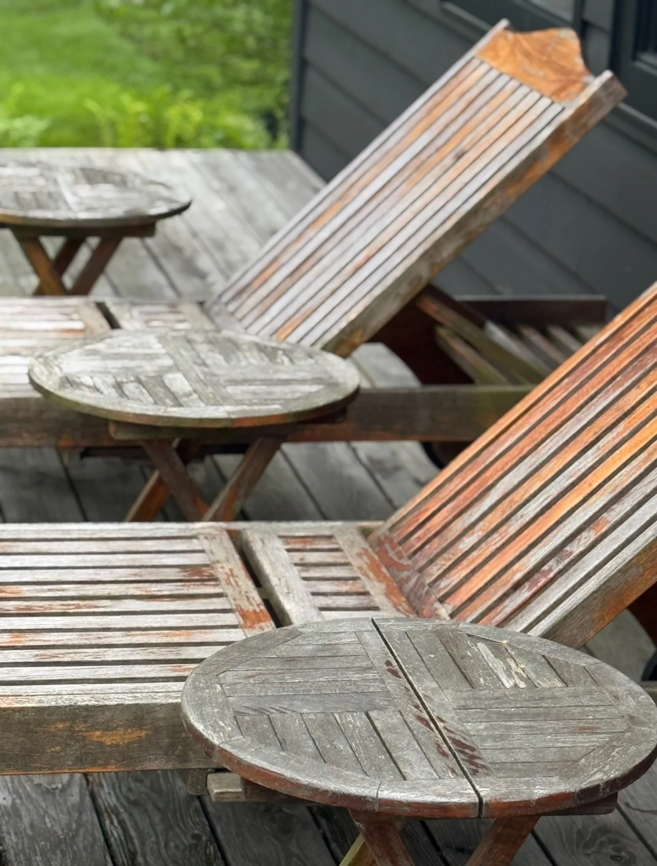 Weathered grey teak recliner before restoration in Port Carling, Muskoka Lakes