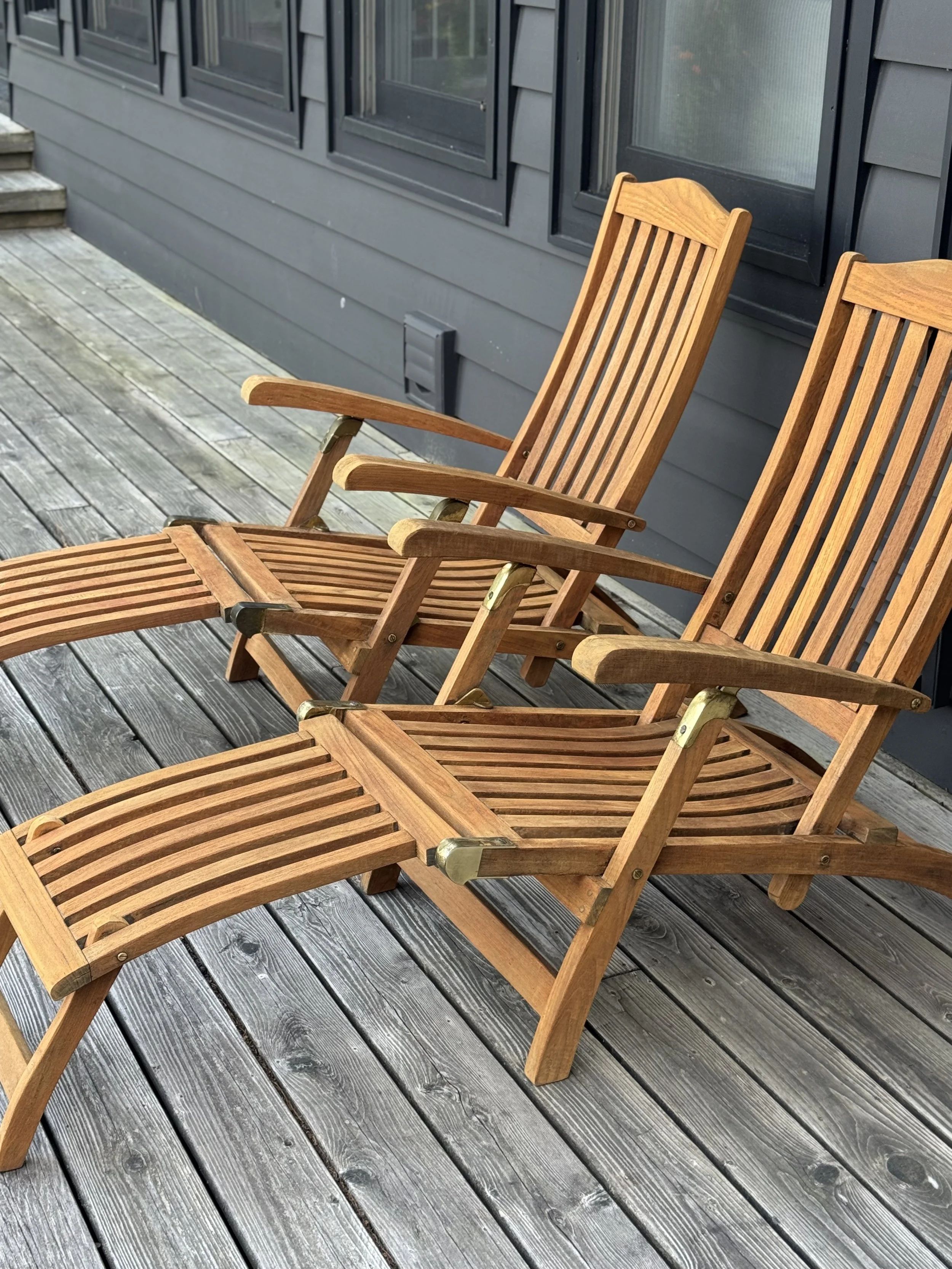 Restored teak steamer chair with warm honey finish in Port Carling, Muskoka Lakes