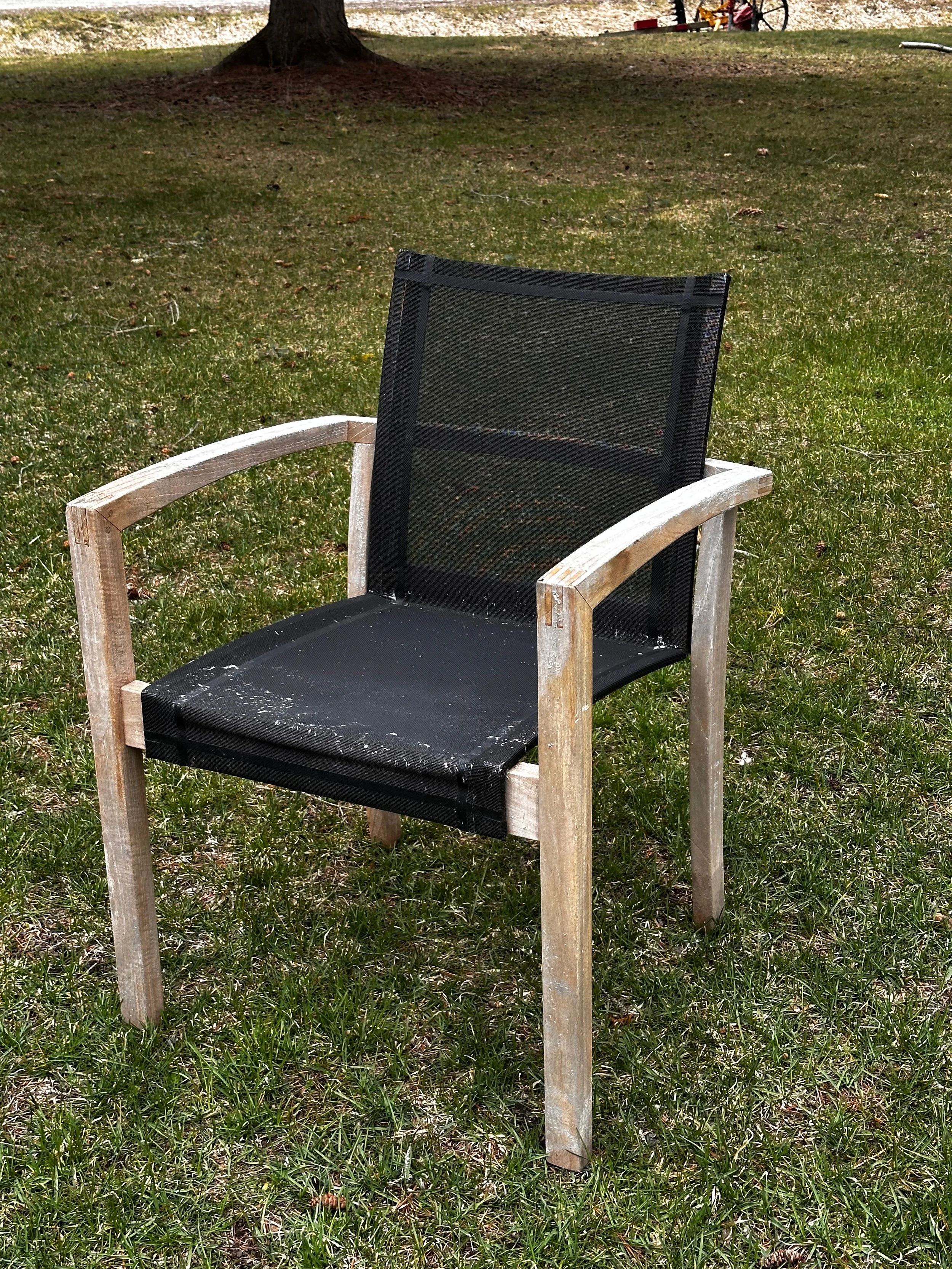 Weathered grey teak chair before restoration in Whitchurch-Stouffville, ON