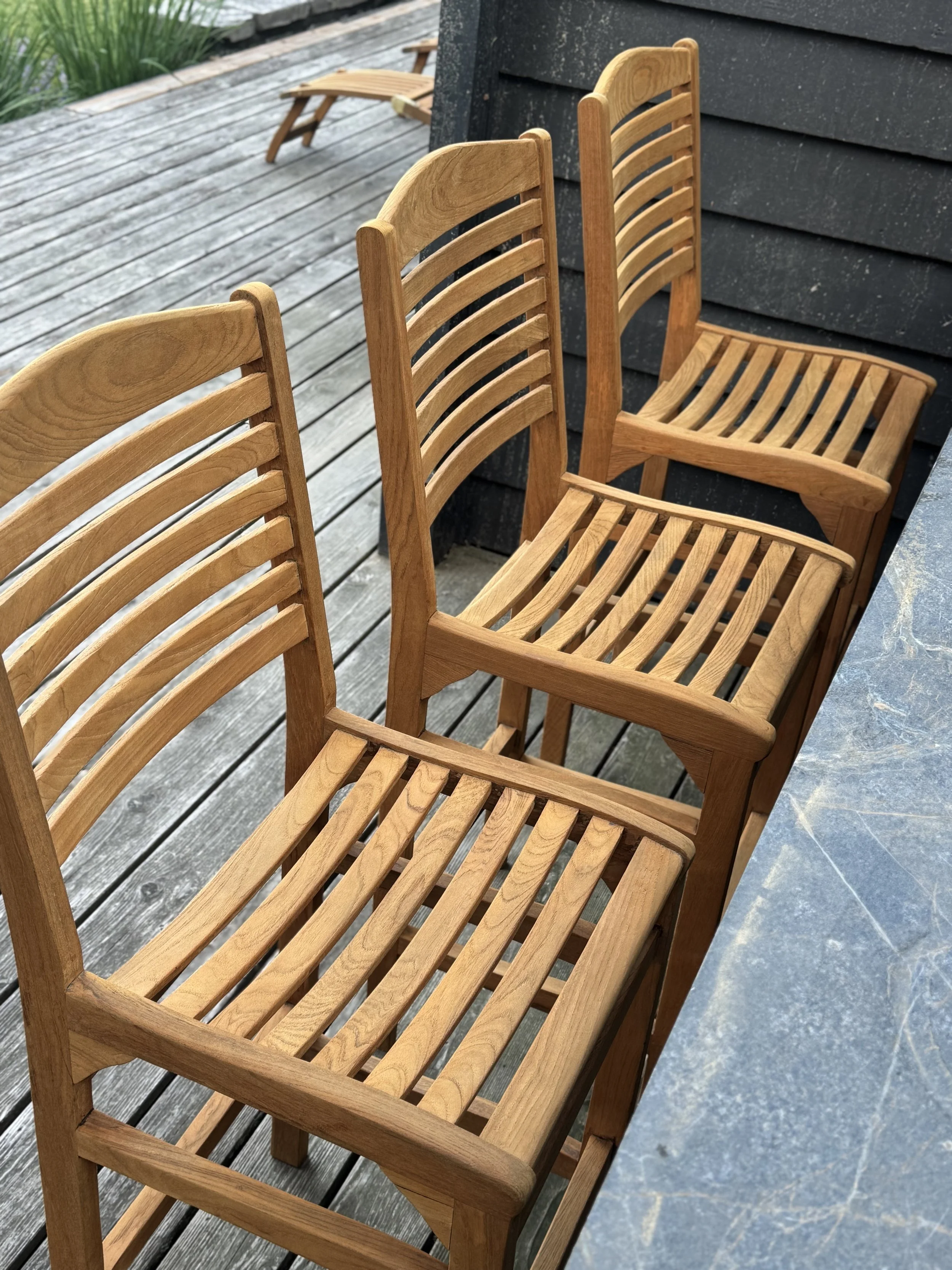 Restored teak furniture with warm honey finish in Port Carling, Muskoka Lakes