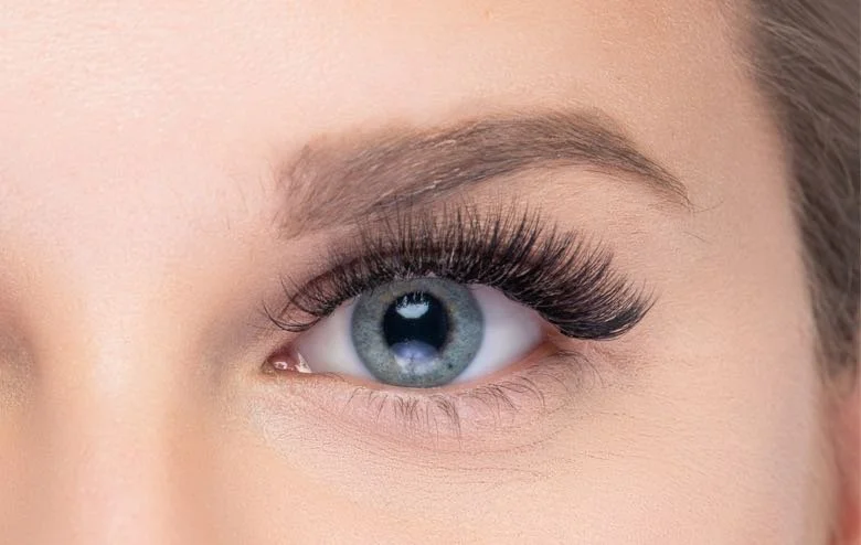 Lashes after a volume full set — full, fluffy coverage.
