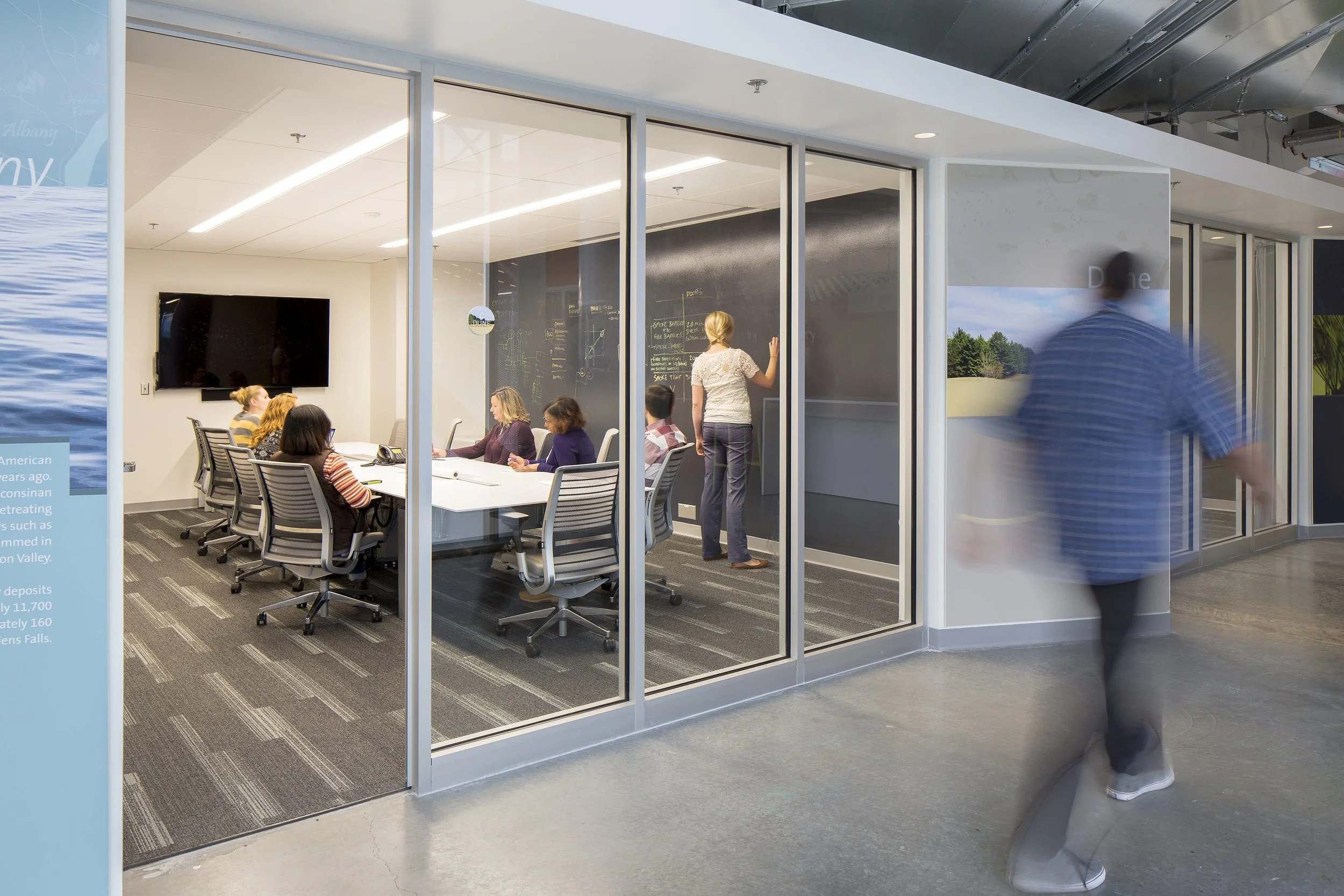 Glass-walled meeting room - photography by Studio Basel Media